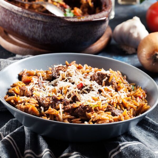 Lamb and barley pasta (orzo) baked in the oven